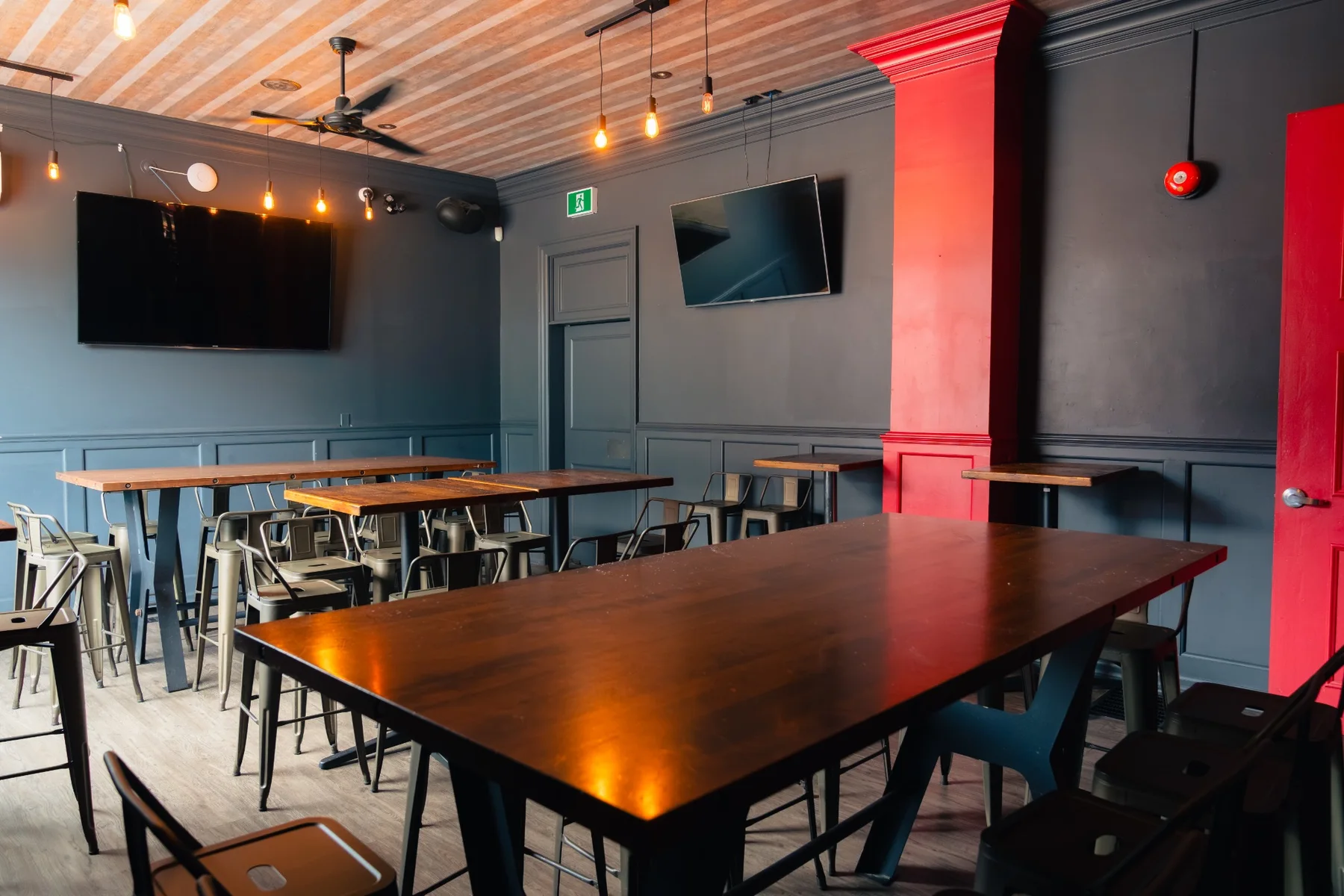 The private event room at One Eighty Hunter with flexible table layouts